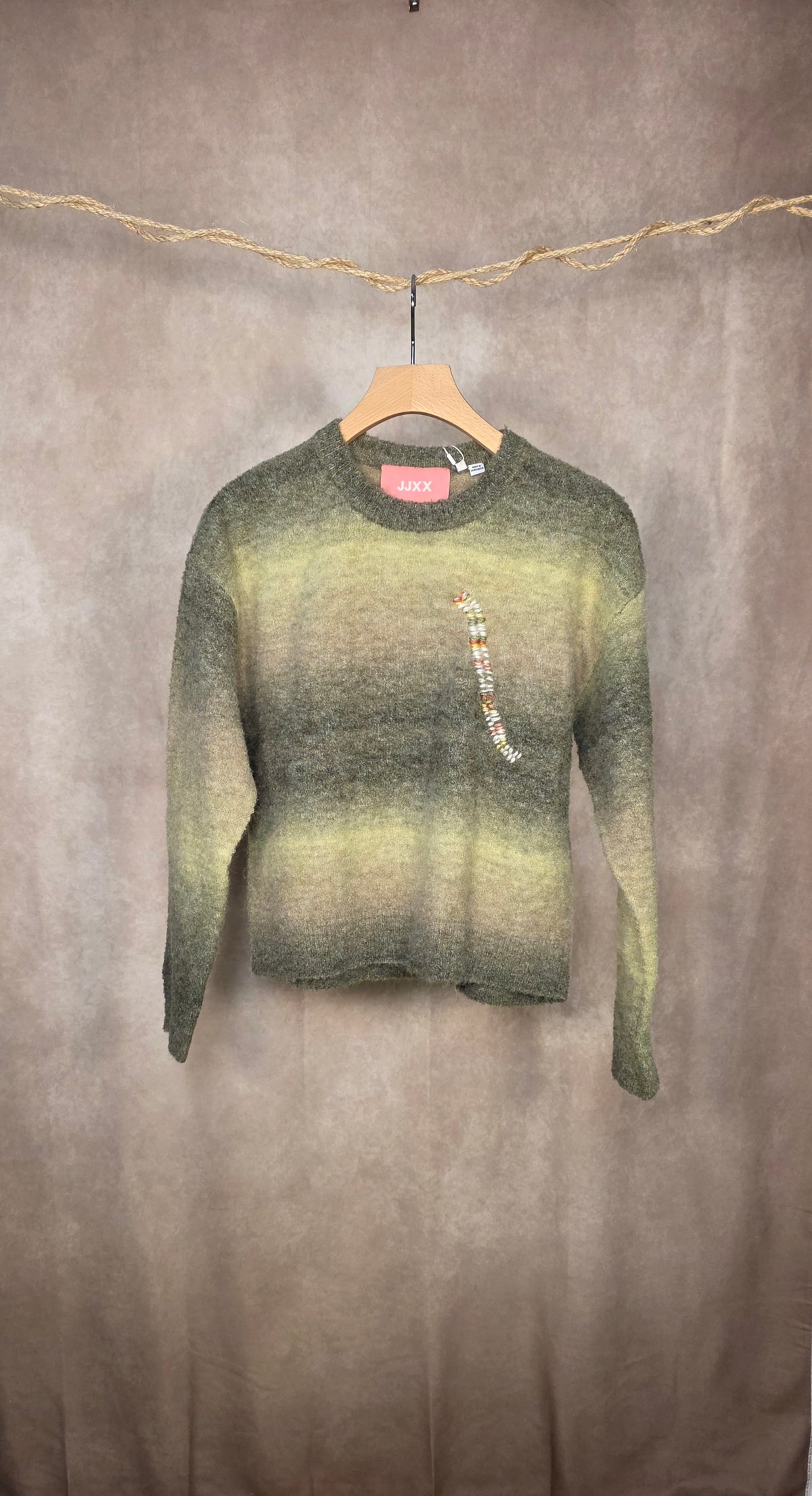 Maglia a righe sfumate di verde