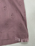 Camicia con ricami traforati e volant