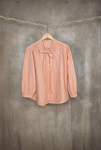 Camicia a maniche lunghe con fiocco al collo