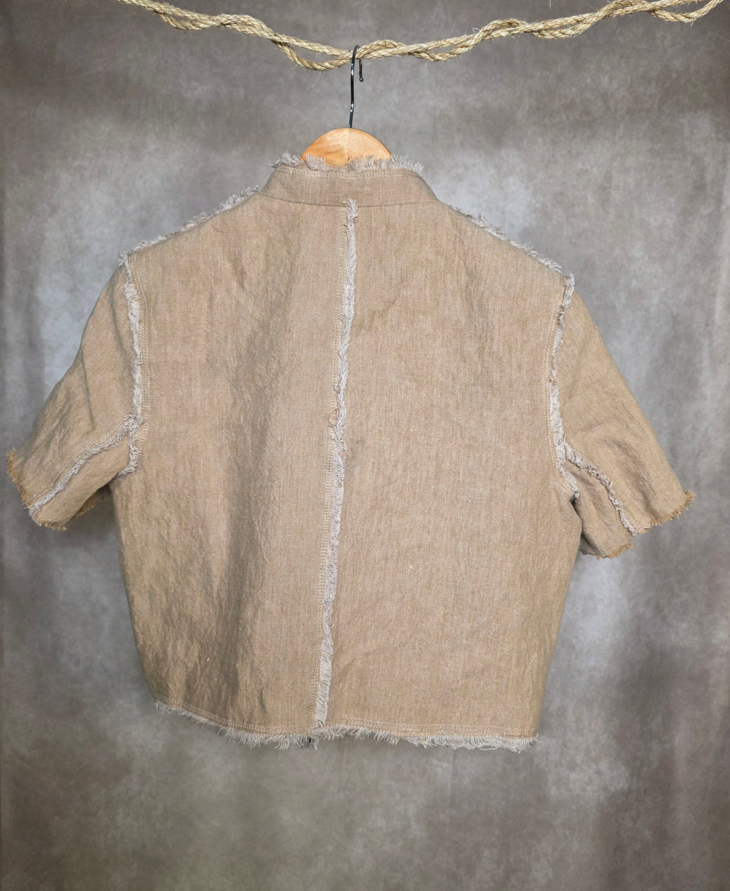 Blazer con bordi sfrangiati