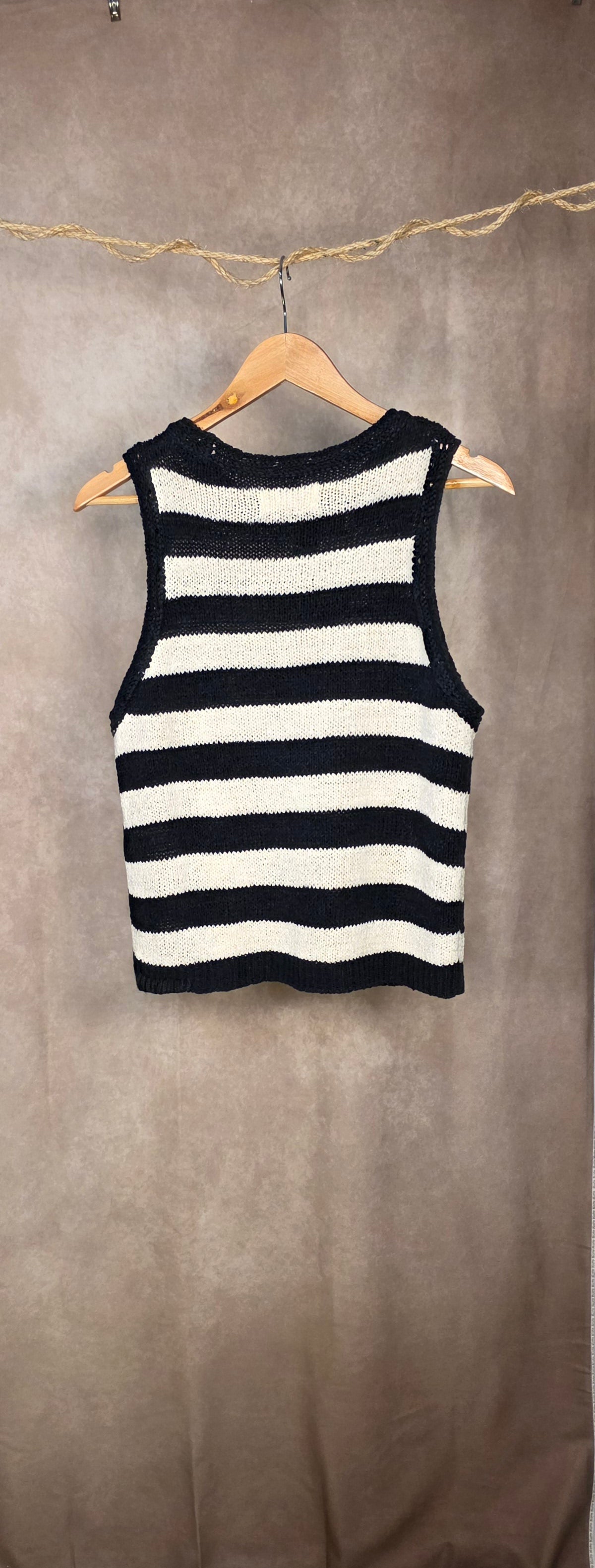 Top smanicato in maglia