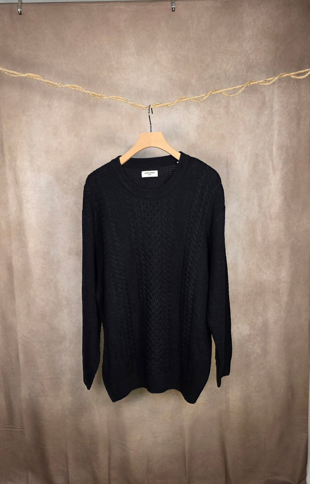 Maglione in maglia a trecce