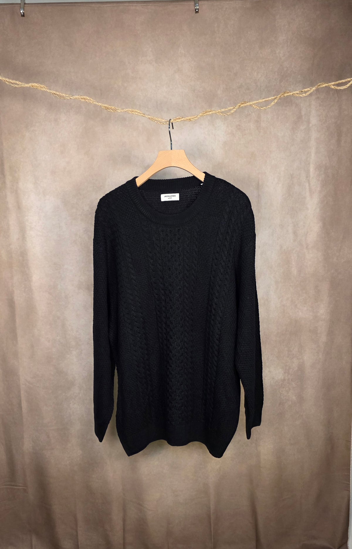 Maglione in maglia a trecce