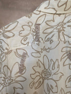 Camicia con stampa floreale neutra