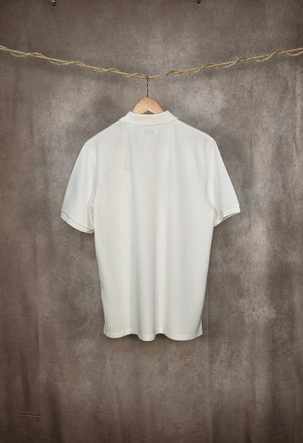 Polo in misto cotone con zip