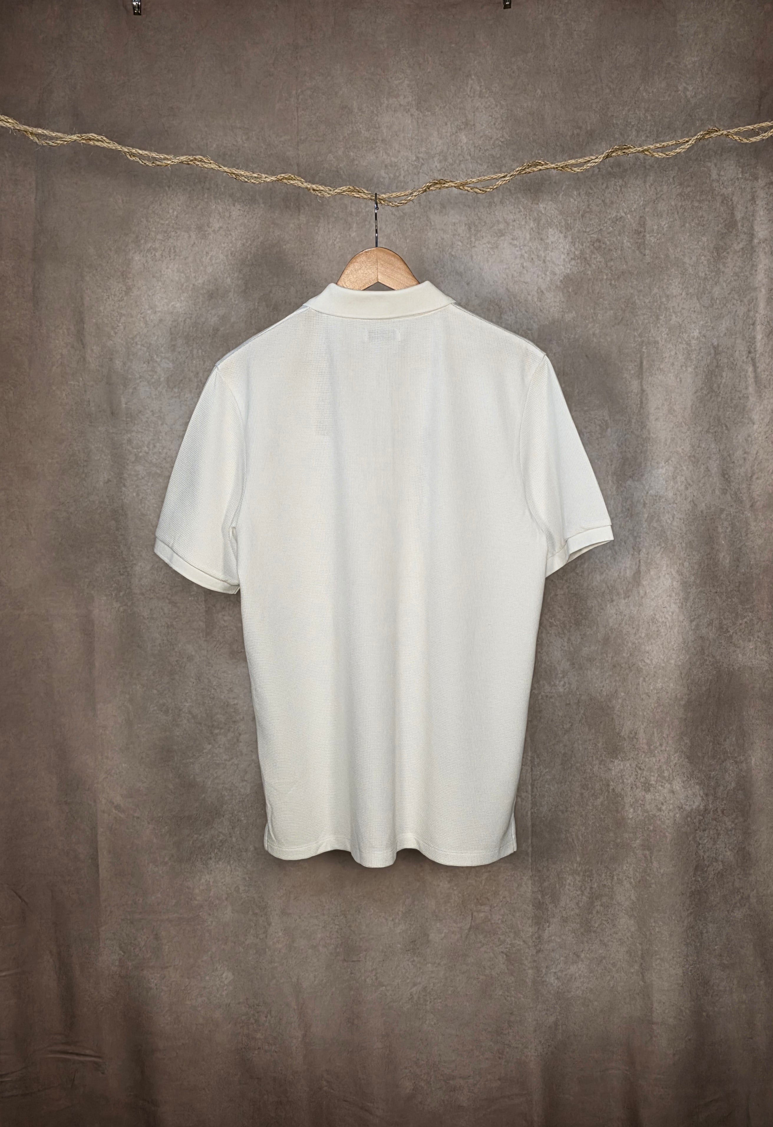 Polo in misto cotone con zip