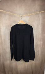 Maglione in maglia a trecce