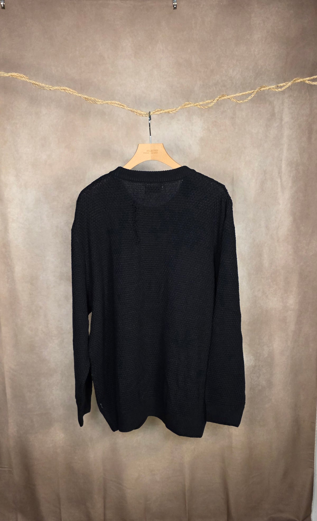 Maglione in maglia a trecce