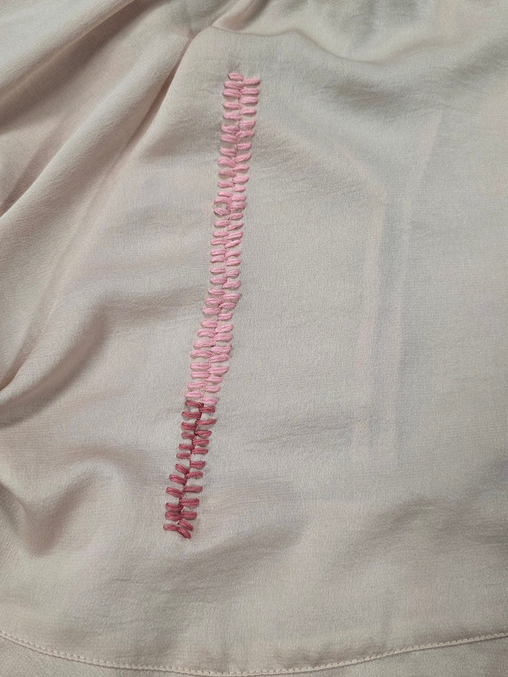 Camicetta rosa cipria con balze