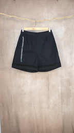 Shorts neri in cotone con bordo in pizzo