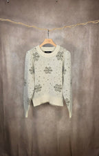Maglione in maglia morbida con fiocchi di neve dorati