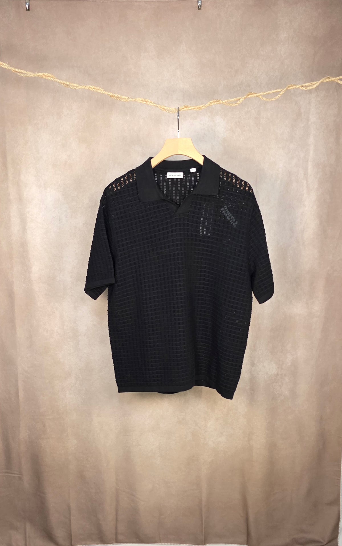 Polo in maglia traforata