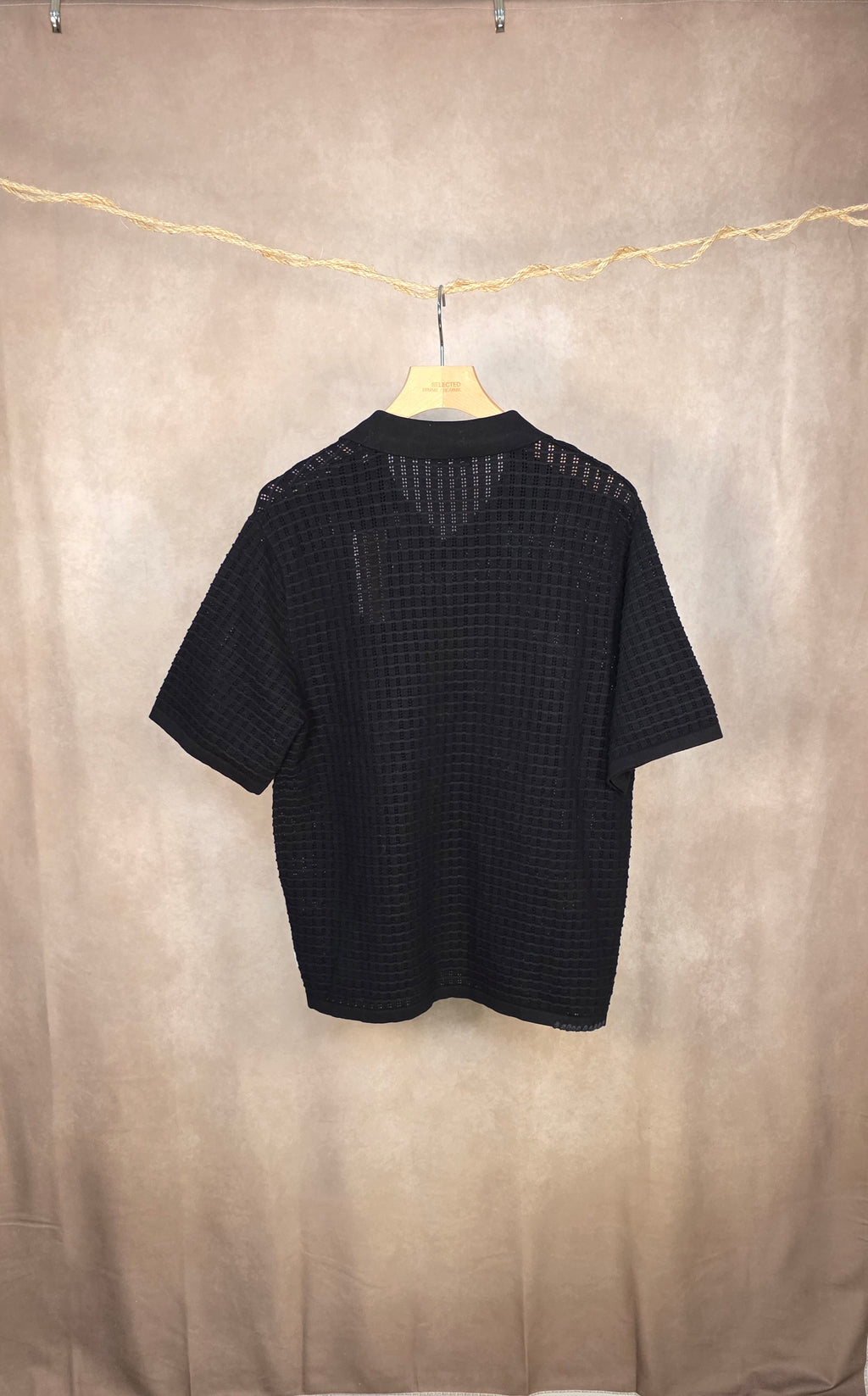 Polo in maglia traforata