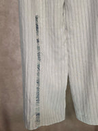 Pantaloni a palazzo gessati