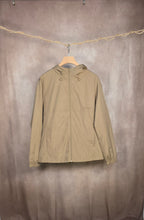 Giacca a vento beige con cappuccio
