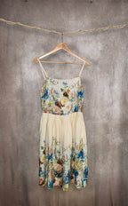 Abito beige a stampa floreale con spalline sottili