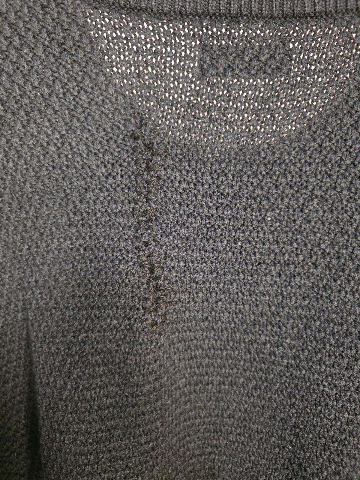 Maglione in maglia a trecce