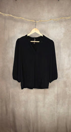 Camicia nera a scollo V