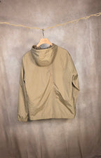 Giacca a vento beige con cappuccio