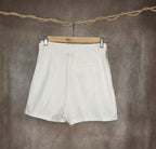Shorts con fibbia