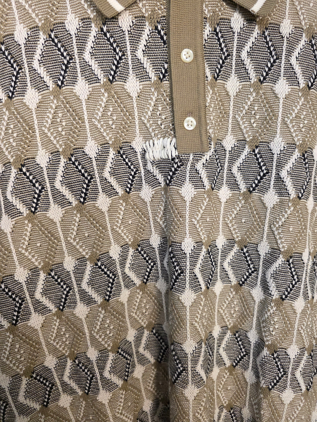 Polo in maglia jacquard geometrica