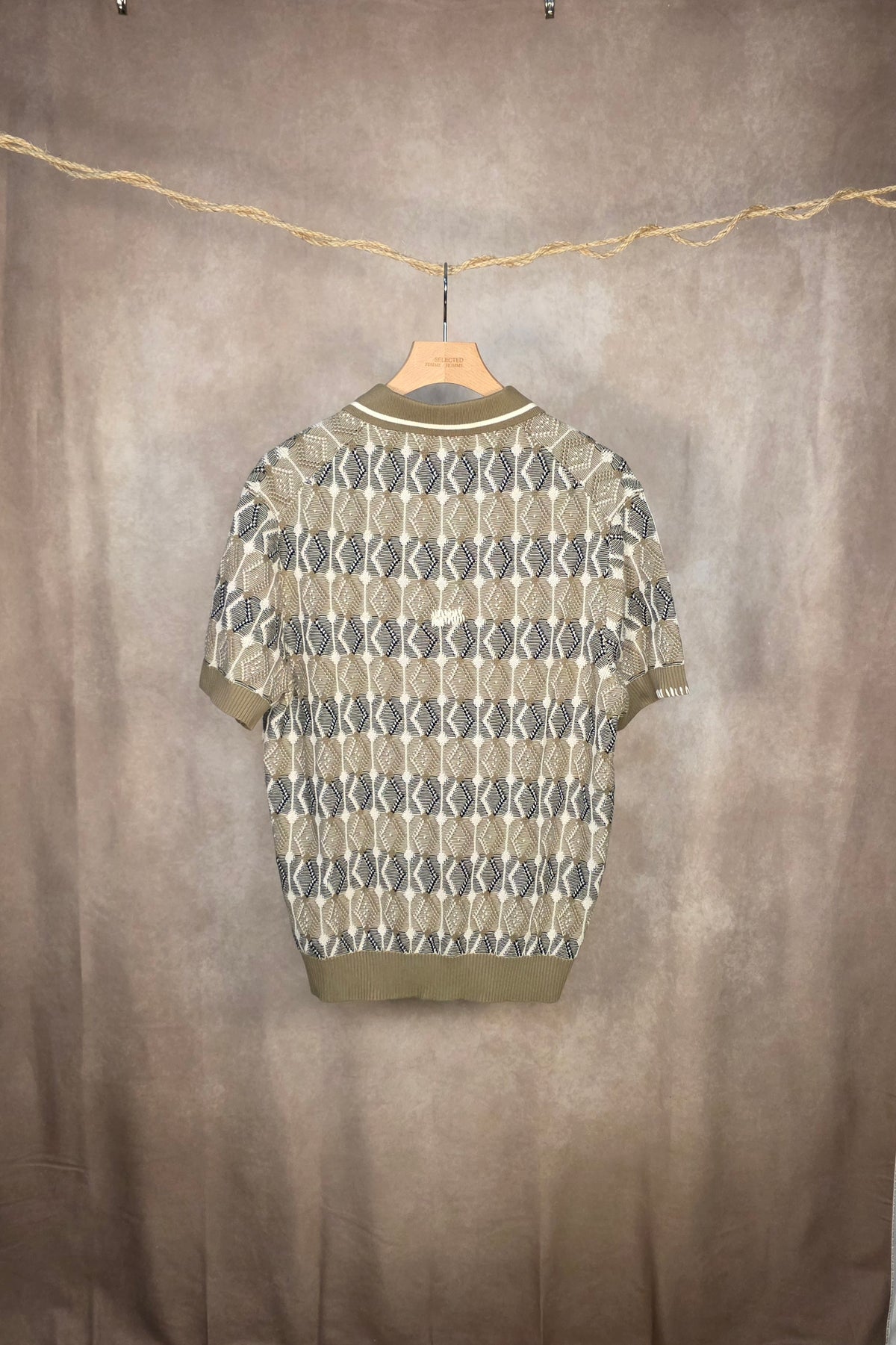 Polo in maglia jacquard geometrica
