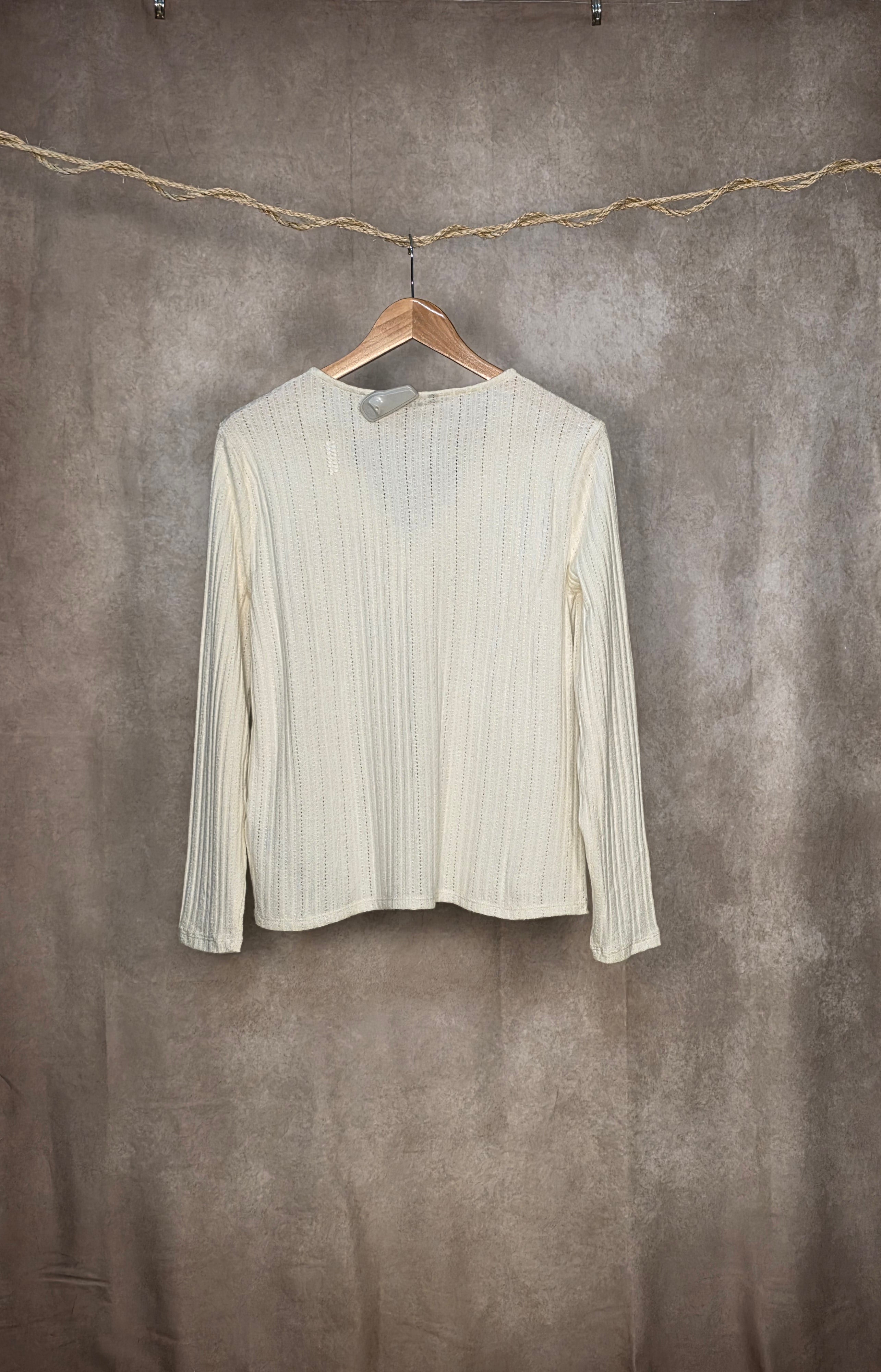 Top in maglia traforata color crema