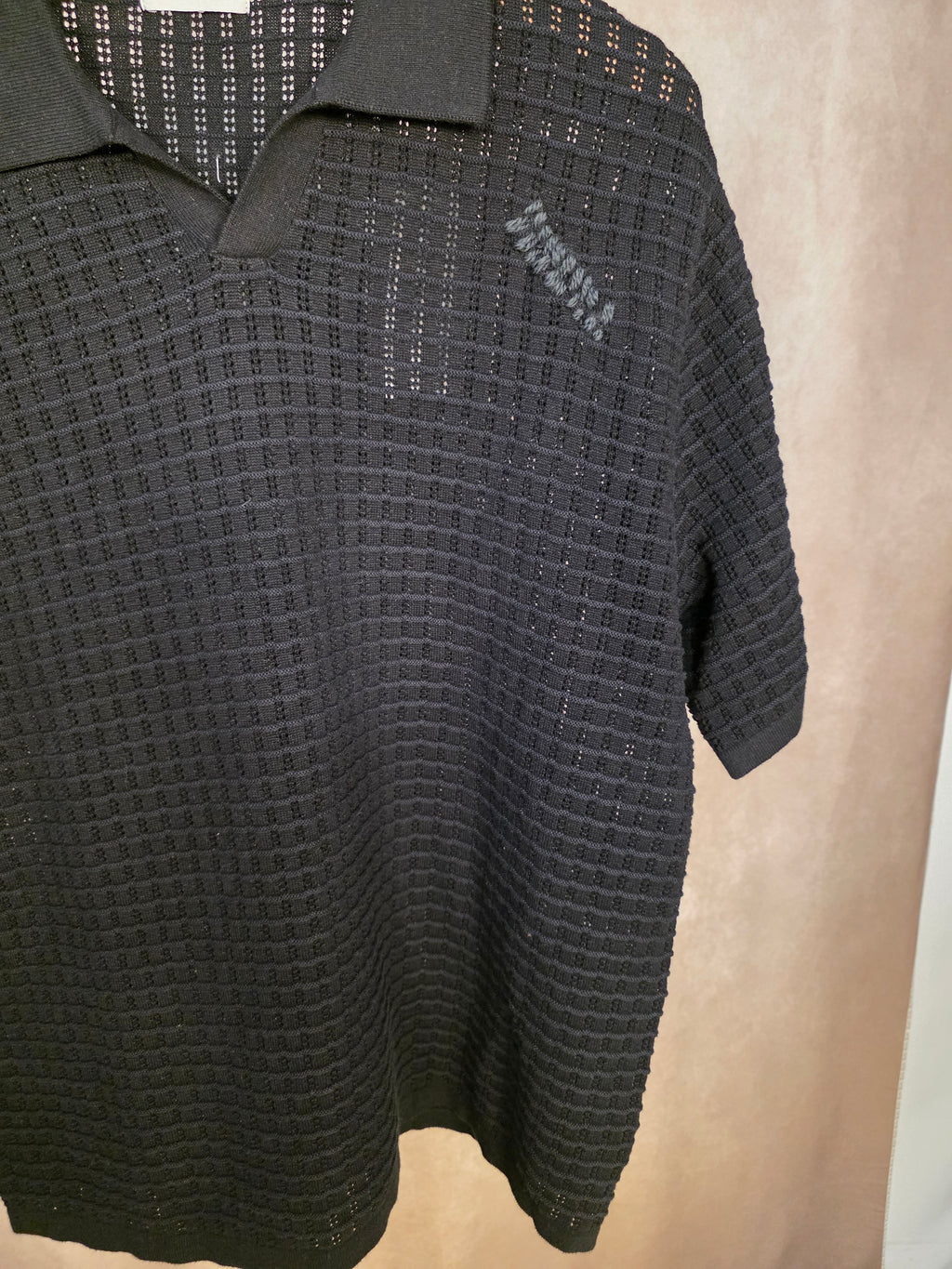 Polo in maglia traforata