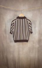 Top a righe con collo a polo