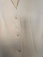 Gilet a scollo V con bottoni color avorio