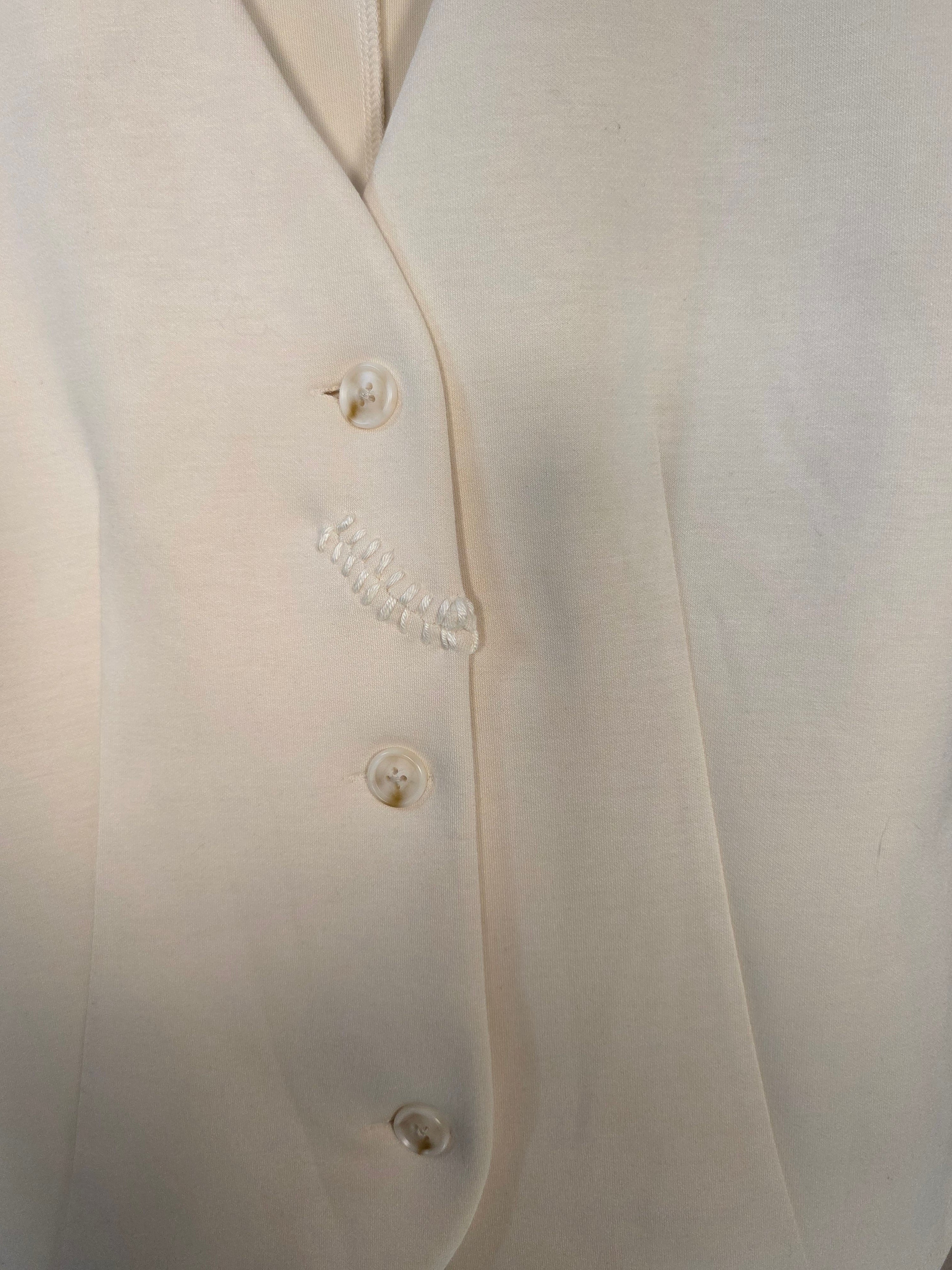 Gilet a scollo V con bottoni color avorio