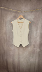 Gilet a scollo V con bottoni color avorio