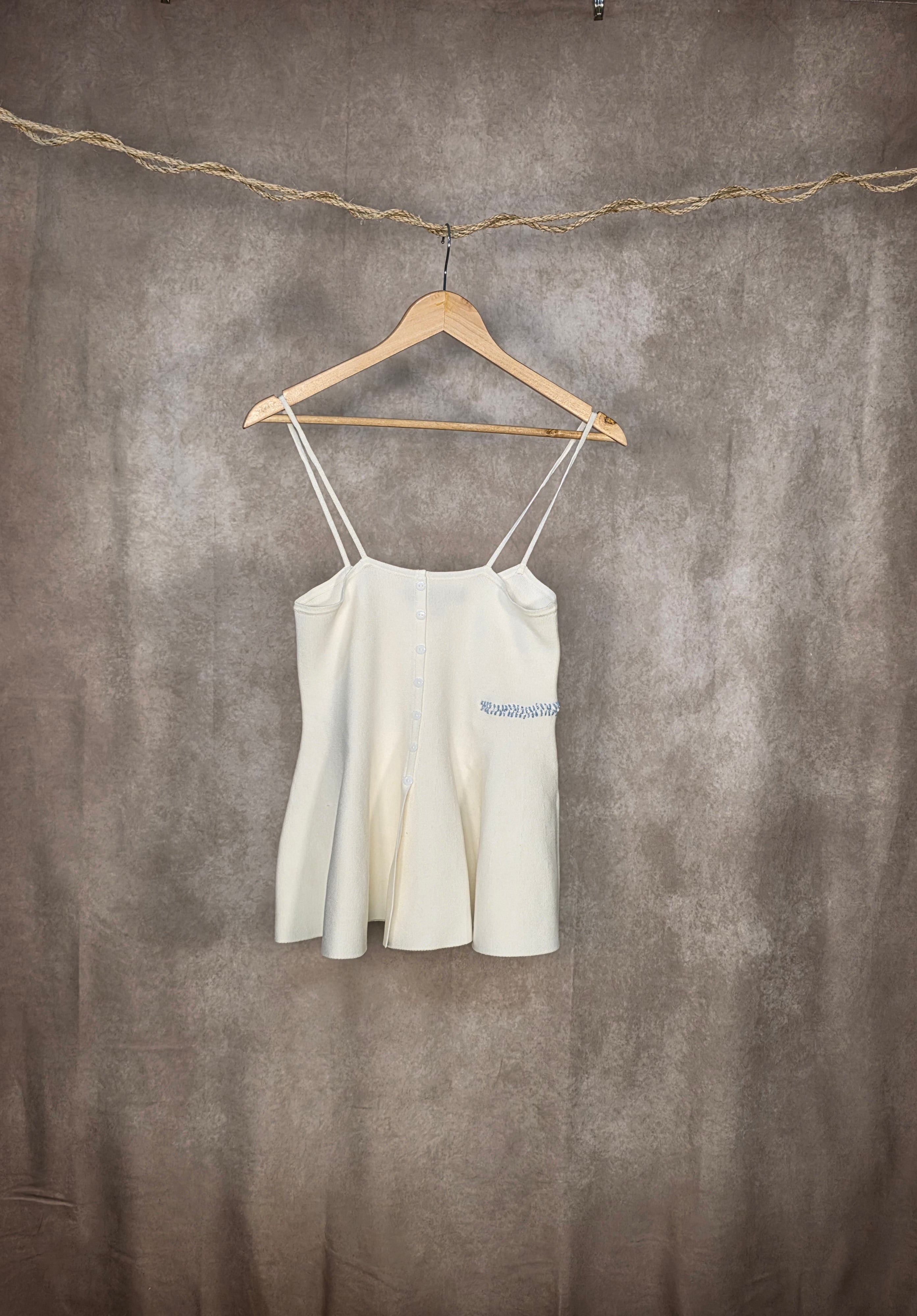 Top peplo in maglia