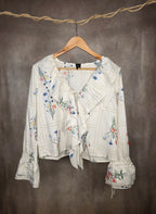 Camicia fantasia floreale e volant