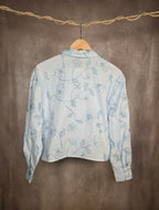 Camicia con ricami floreali