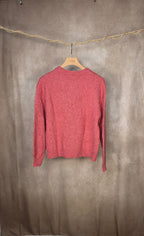 Cardigan rosa con bottoni