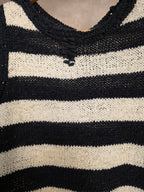 Top smanicato in maglia