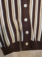 Top a righe con collo a polo