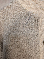 Cardigan bouclè crema