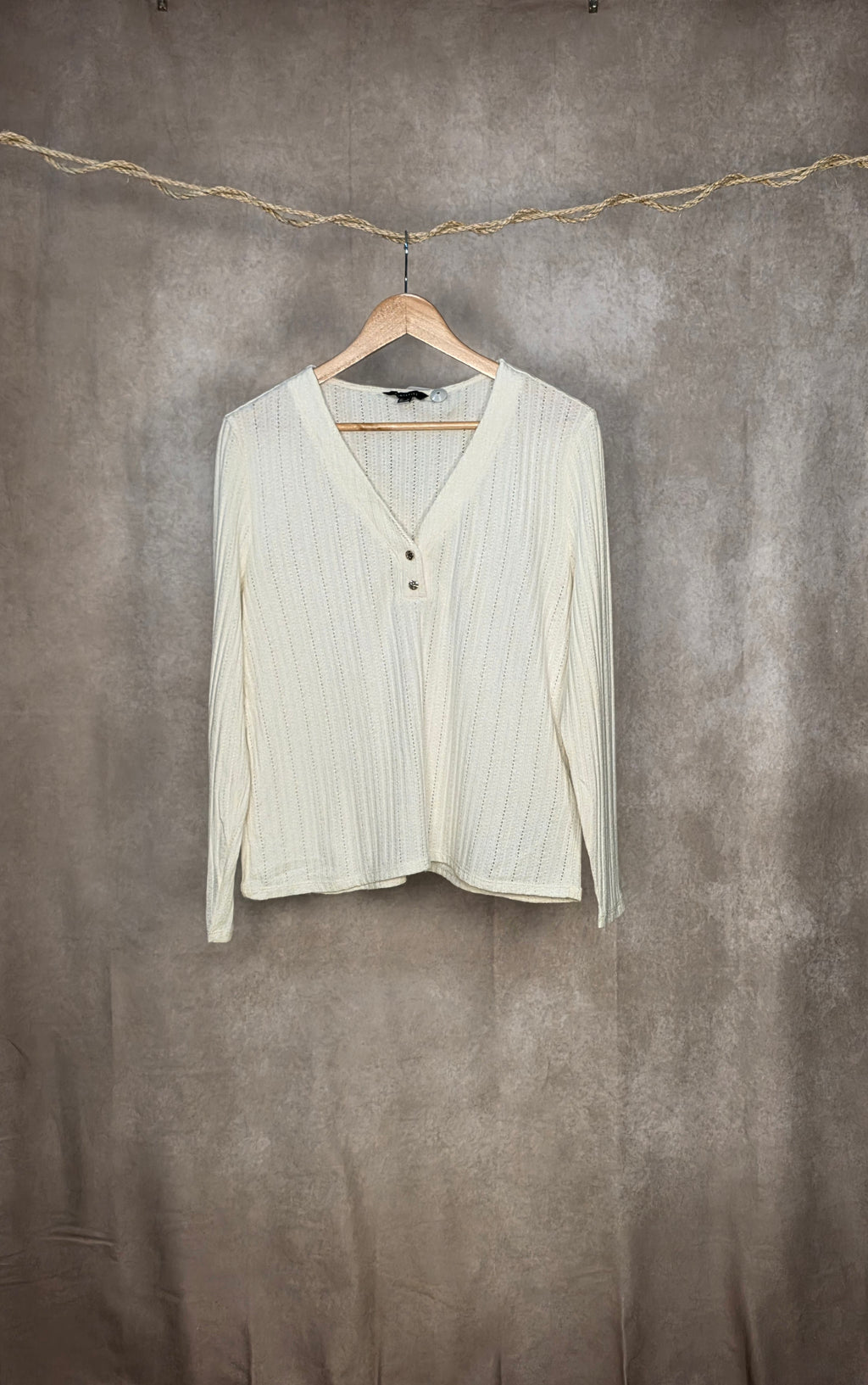 Top in maglia traforata color crema