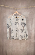 Camicia con ricami floreali neri