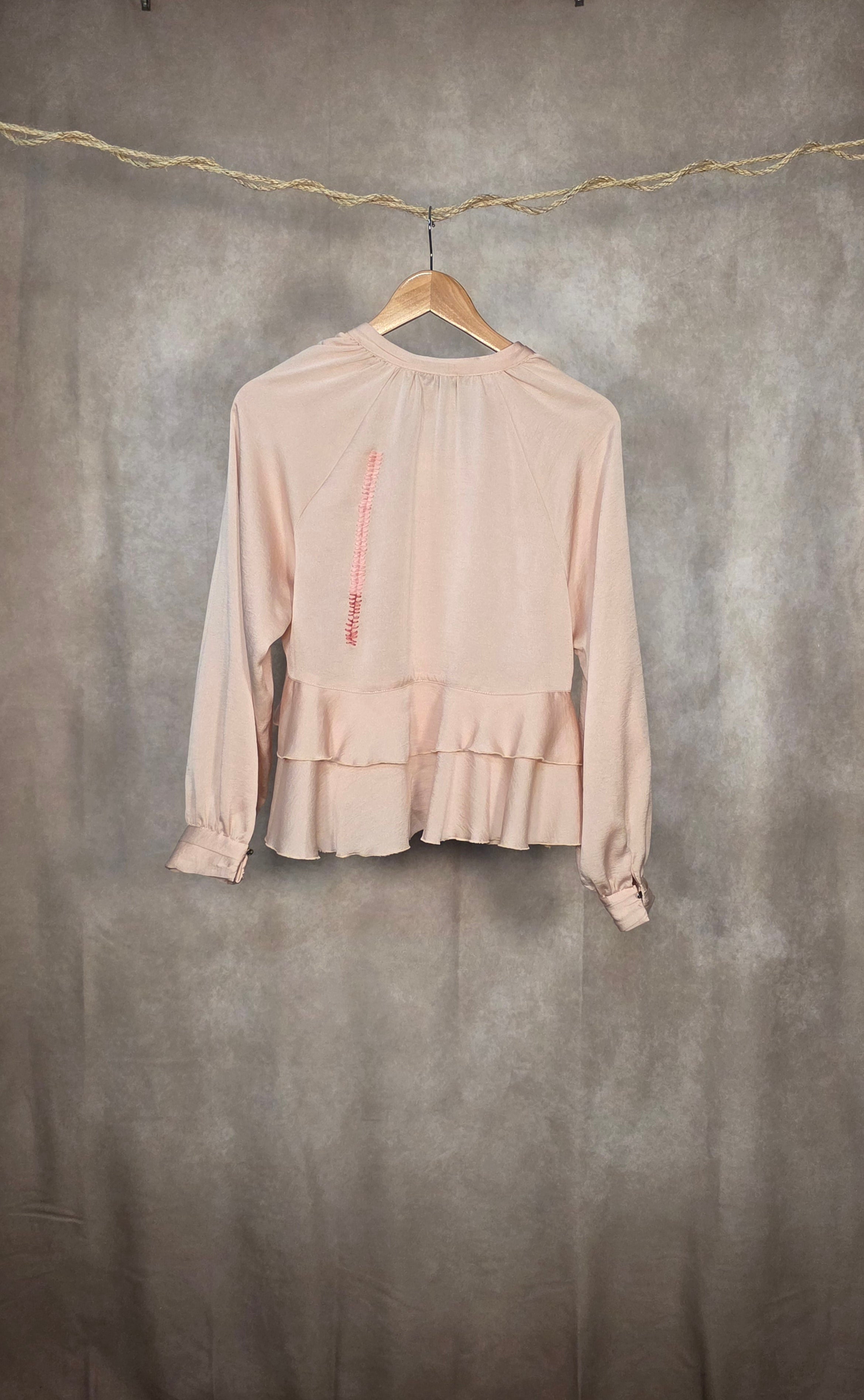 Camicetta rosa cipria con balze