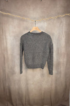 Maglione intrecciato con dettagli traforati