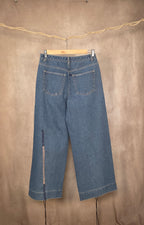Jeans a gamba larga con lacci intrecciati