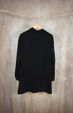 Camicia drappeggiata dal taglio morbido