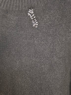 Maglia nera con perle